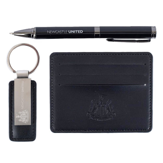 Luxury gift set comprising of a executive leather key fob, a luxury ball point pen and a faux leather card holder, Each item is subtly branded with Newcastle United text and a crest, complimenting the executive appearance of the set