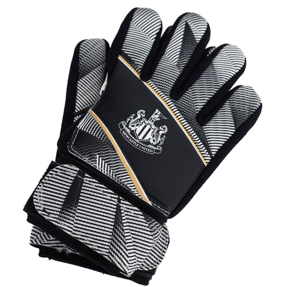 Black and white goalkeeper gloves featuring the Newcastle crest in white