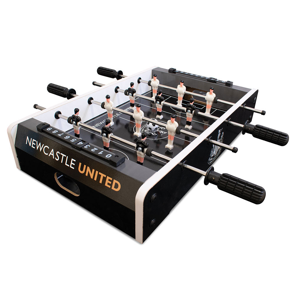 Table top, football game with a black pitch design, 6 players per team in black or white