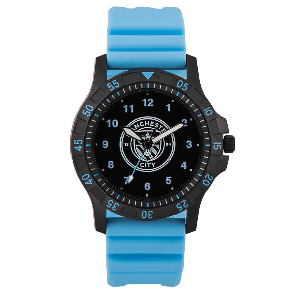 Black metal watch with a Man City blue silicone strap and a black stainless steel face and buckle