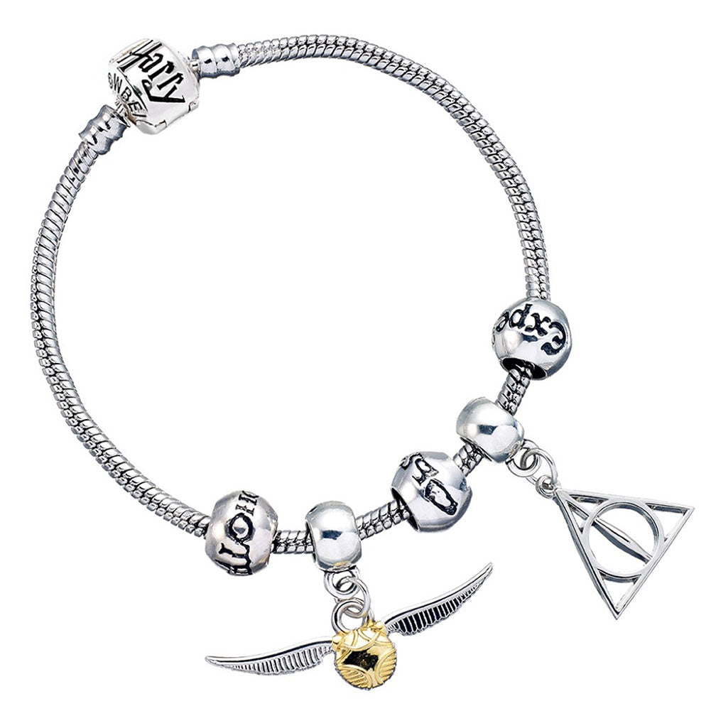 Harry Potter Deathly Hallows and Golden Snitch charms on a silver plated charm bracelet with three spellbeads